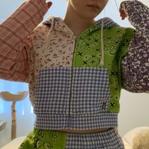 TEDDY FRESH WOMEN’S GREEN MULTI PATCHWORK ZIP-UP in a size medium.